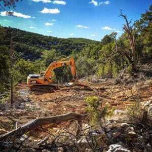 Land clearing operation in Fredericksburg TX with excavator and forestry mulcher